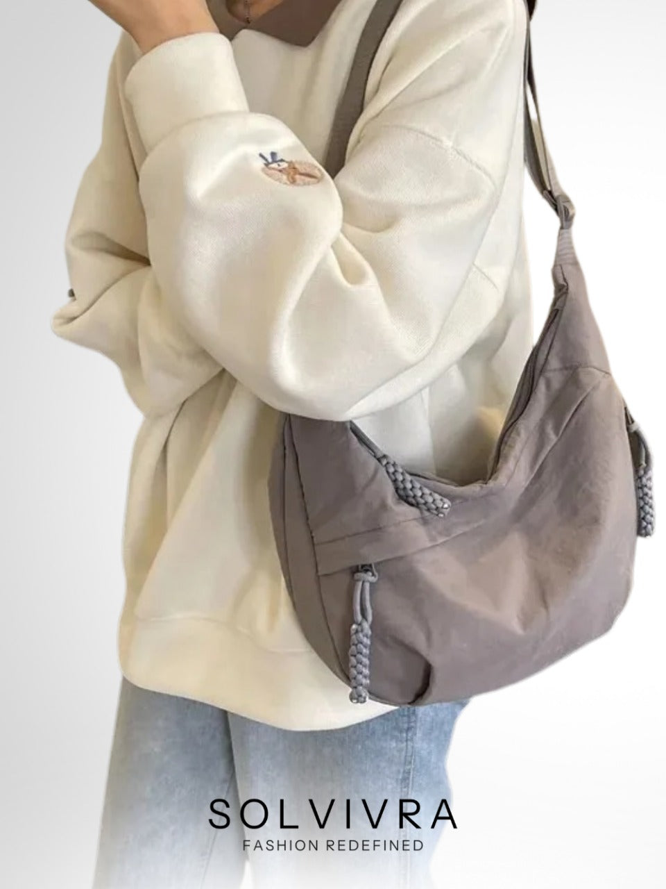 Solvivra Dumpling Crossbody Bag
