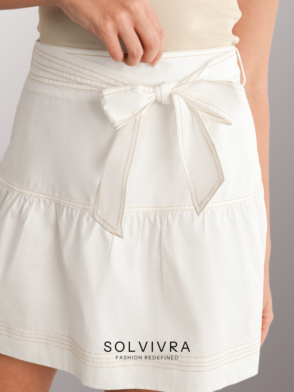 Solvivra Snatched in White Mini Skirt